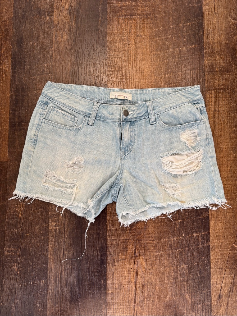 Forever21 light wash raw hem distressed denim shorts
